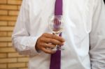 Man Holding A Glass Of  Wine Stock Photo