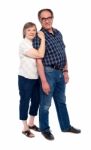 Smiling Aged Couple Standing Stock Photo