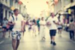 Blurred People Walking On The Street Of Old Town Stock Photo