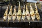 Cat Fish On The Grill At The Market In Thailand Stock Photo