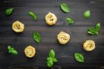 Ingredients For Homemade Pasta On Dark Wooden Background Stock Photo