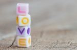 Love Symbol Icon On Wood Background Stock Photo