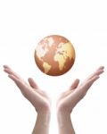 Earth Globe In Hands Stock Photo