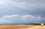 Bale Of Hay And Rainbow Stock Photo