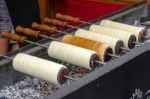 Charcoal Grilled Potato On A Market Stall In Bergamo Stock Photo