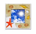 Frame Of Sea Shell On Blue Sky Stock Photo