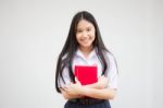 Asia Thai High School Student Uniform Beautiful Girl Read A Book Stock Photo