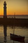 Lighthouse at dusk Stock Photo