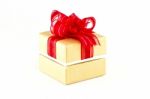 Gift Box With Red Ribbon Stock Photo