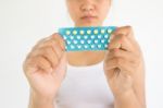 Woman With Combined Pills In Hands,woman Healthcare Concept And Ideas Stock Photo