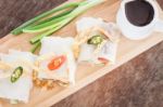 Fresh Spring Rolls On Wooden Table Stock Photo