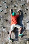 Man Climb On The Rock Stock Photo