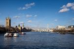 View Along The River Thames To The Houses Of Parliament Stock Photo