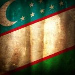 Old Grunge Flag Of Uzbekistan Stock Photo