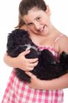 Girl Holding Dog Stock Photo