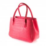 Red Artificial Crocodile Leather Bag Stock Photo