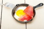 Egg Sunny Side Up With Italian Speck Ham Stock Photo