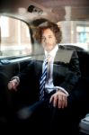 Handsome Business Corporate Inside Taxi Cab Stock Photo