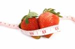 Strawberries And Tape Measure Stock Photo