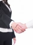 Handshaking Female Hands Stock Photo