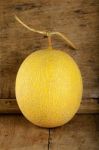 Yellow Cantaloupe Melon On The Wooden Background Stock Photo