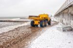 Big Truck Riding On The Beach Stock Photo