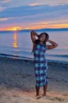 Beautiful Black African American Woman Posing On The Beach At Su Stock Photo