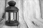 Black Lamp On Wooden Background	 Stock Photo