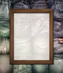 Wooden Picture Frame On Collage Jeans Stock Photo