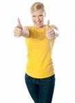 Woman Showing Double Thumbs-up Stock Photo