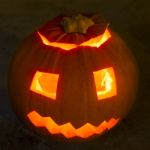 Carved Lit Halloween Pumpkin Stock Photo