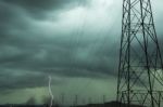 High Voltage Power Lines During A Storm Stock Photo