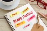 Brand Strategy Marketing Concept With Work Table Stock Photo