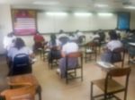 Blur Background University Students Writing Answer Doing Exam In Stock Photo