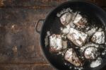 Fried Angus Beef With Flour In The  Pan Top View Stock Photo