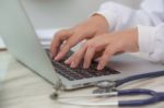 Closeup Of Business Woman Hand Typing On Laptop Keyboard Stock Photo