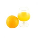 Orange Juice In Brandy Glass And Fruit On White Background Stock Photo