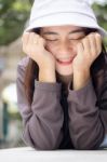 Thai Adult Girl White Cap Gray T-shirt Beautiful Girl Relax And Smile Stock Photo