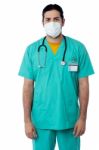 Male Doctor Wearing Face Mask Stock Photo