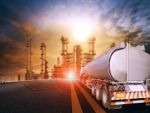 Oil Container Truck And Heavy Petrochemical Industries Plant For Petroleum Fuel Industrial Theme Stock Photo