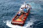 Supply Boat Transfer Cargo To Oil And Gas Industry Stock Photo