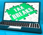 Tax Breaks On Laptop Showing Internet Taxing Stock Photo