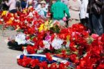Flowers Near The Monument On Victory Day Stock Photo