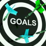 Goals On Dartboard Shows Aspirations Stock Photo