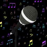 Microphone Closeup With Music Notes Shows Songs Or Hits Stock Photo