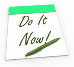 Do It Now Notepad Shows Take Action Straight Away Stock Photo