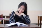 Portrait Of Thai Teen Beautiful Girl Writing Book Stock Photo