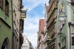 Various Hanging Signs In Rothenburg Stock Photo