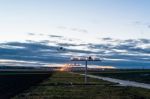 Approaching The Airport At Dusk Stock Photo