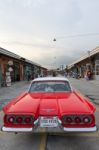 Old Vintage Red Car At Night Market, Srinakarin Road, Thailand Stock Photo